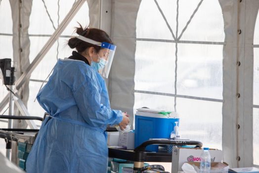 A technician collects nasal swab samples for Covid at the Ben-Gurion International Airport in Israel on March 2, 2022.